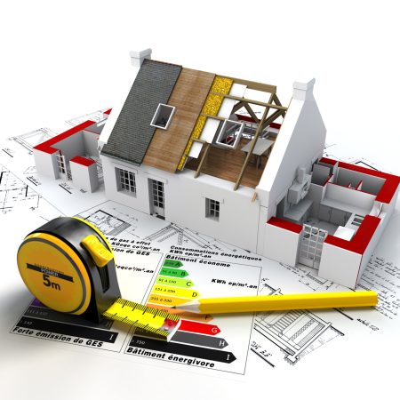 3D rendering of a house in construction, on top of blueprints, with and energy efficiency rating chart