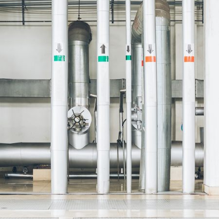 steel pipelines and cables in a plant,Industrial zone.